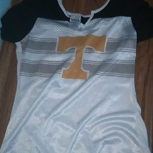 Size s/p white orange and black shirt.